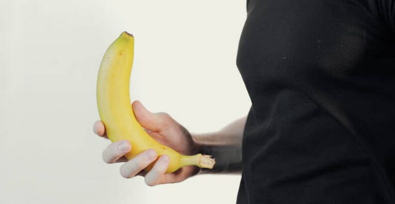 masažas varpos didinimui naudojant banano pavyzdį